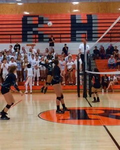 Roseburg's Carolyn Cuilty goes up on the attack against North Medford. (Photo: Josh Gaunt)